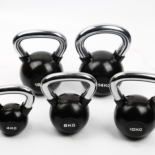 Set of black coated kettlebells with chrome handles in various weights for home gym strength training